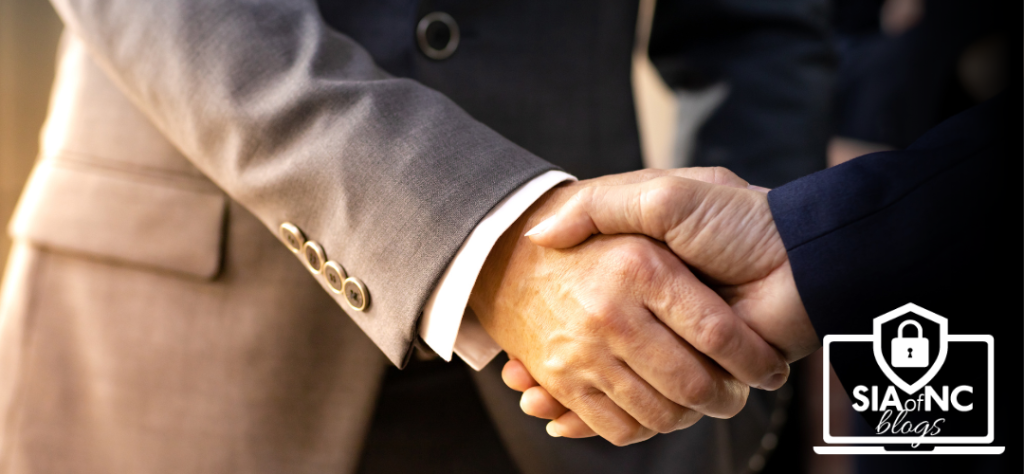 stock photo of gentlemen shaking hands